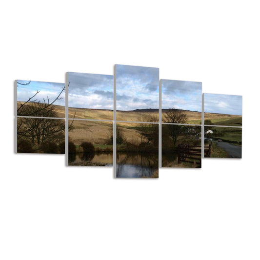 Left-angled view of 10 acoustic panels showing a golden field, pond reflection, and countryside road in full color.