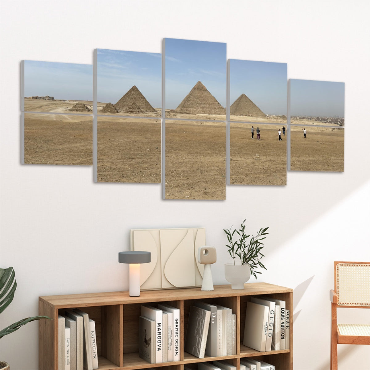 Modern interior featuring artwork of the Giza pyramids set against a pale desert sky