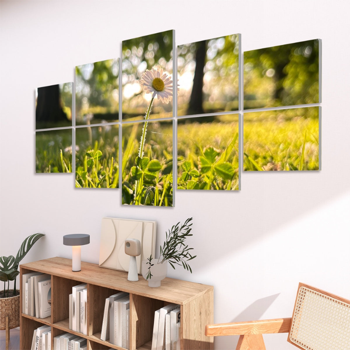 Right-angled view of floral sound absorbing panels showing a daisy glowing in afternoon light among clover leaves.