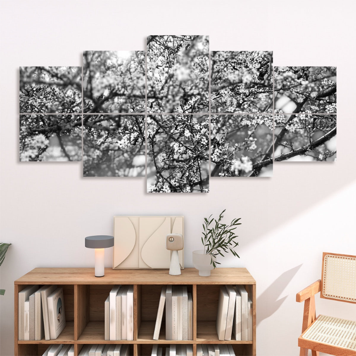 Black and white abstract photo of tree branches and blossoms in soft focus, arranged on 10 decorative sound absorbing wall panels.