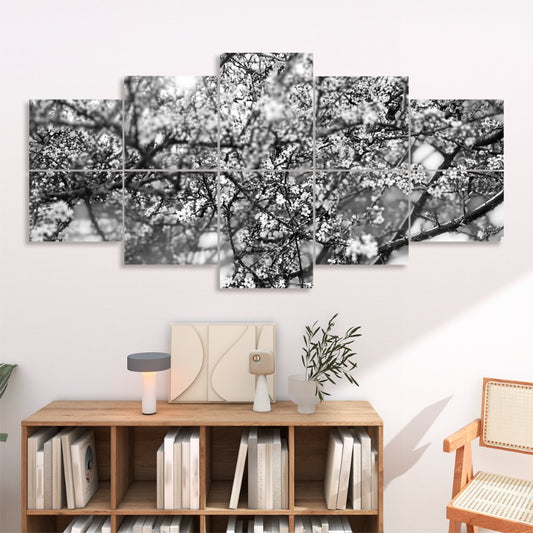 Black and white abstract photo of tree branches and blossoms in soft focus, arranged on 10 decorative sound absorbing wall panels.
