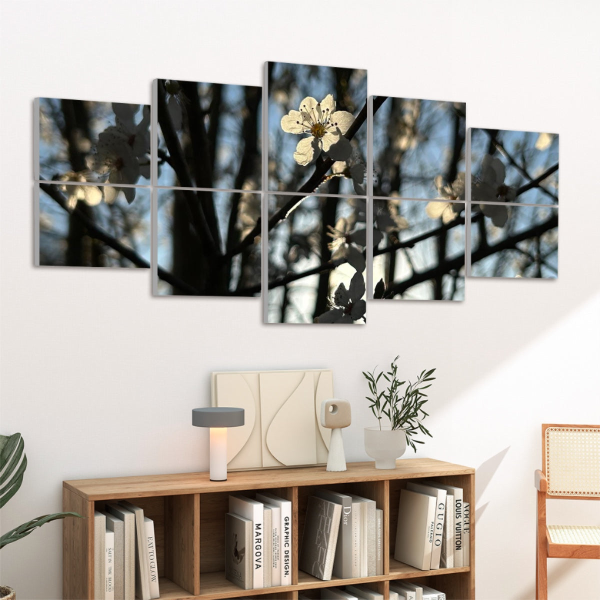 Left-angled view of 10 acoustic panels featuring backlit white flowers against tree branches and pale blue sky in full color.