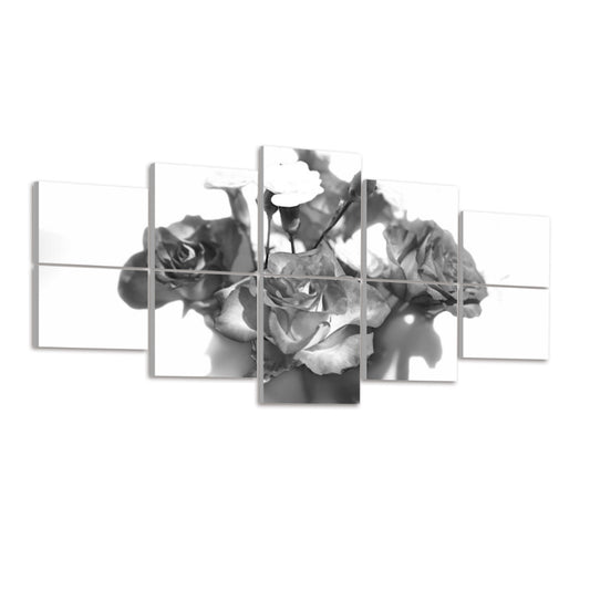 Left-angled view of grayscale acoustic panels featuring delicate rose petals and soft light.