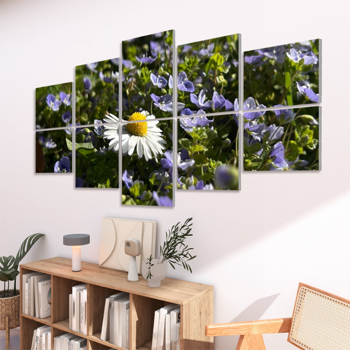 Right-angled view of full color floral panels with daisy petals and violet ground flowers illuminated by natural light.