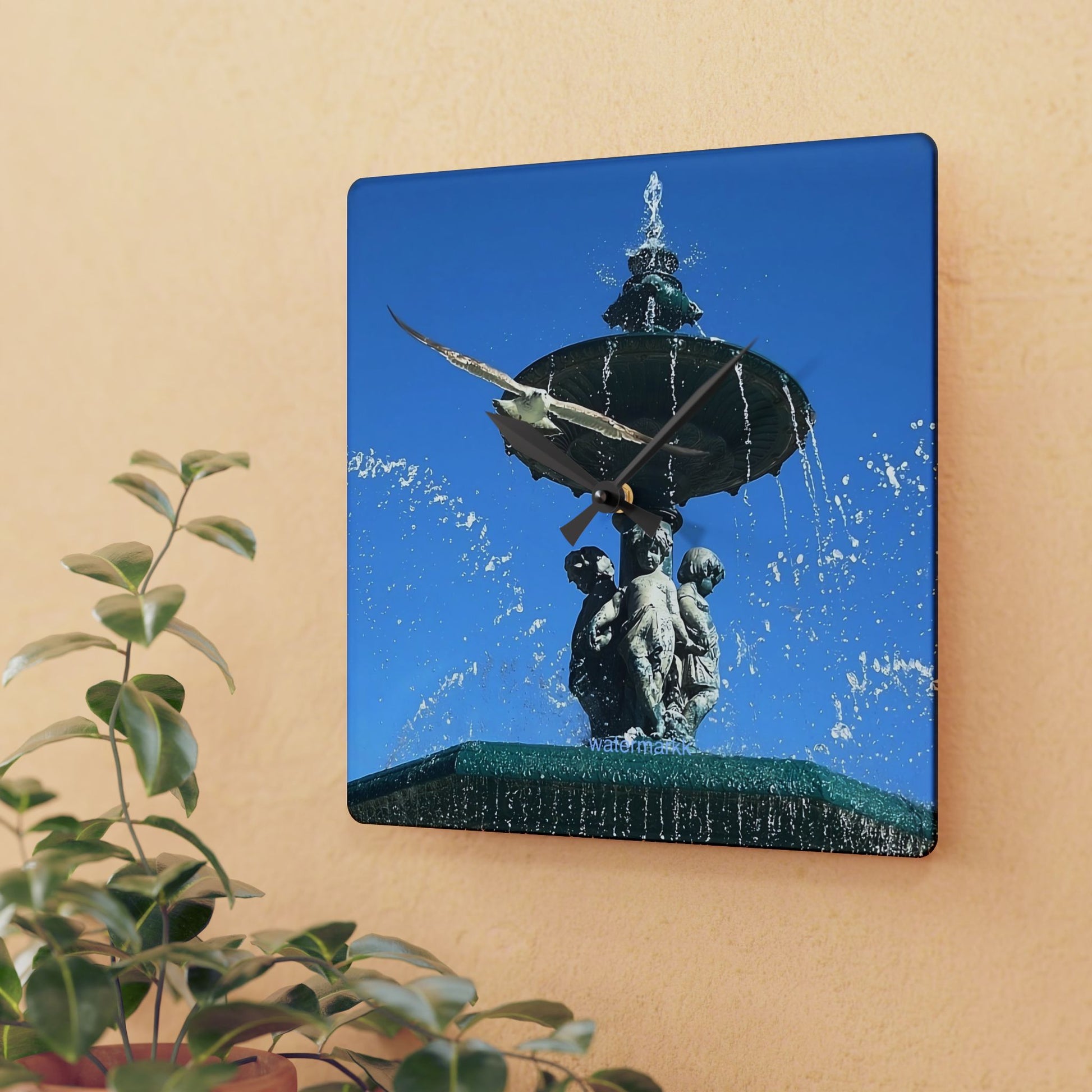 Acrylic wall clock featuring seagull in flight, blue sky and fountain in Lisbon