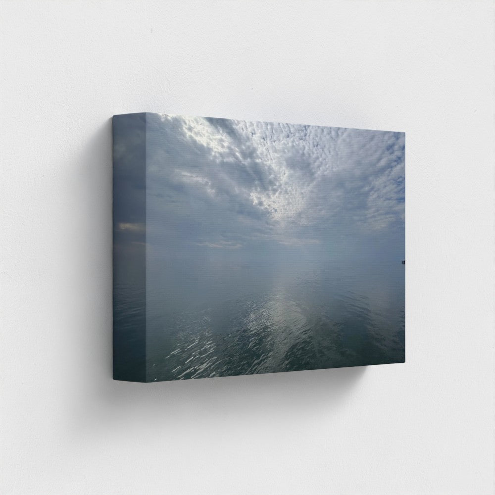 Eco-friendly canvas print of Blackpool seascape with layered clouds, calm water reflections, and a distant pier under a quiet sky, size: 12''x8''