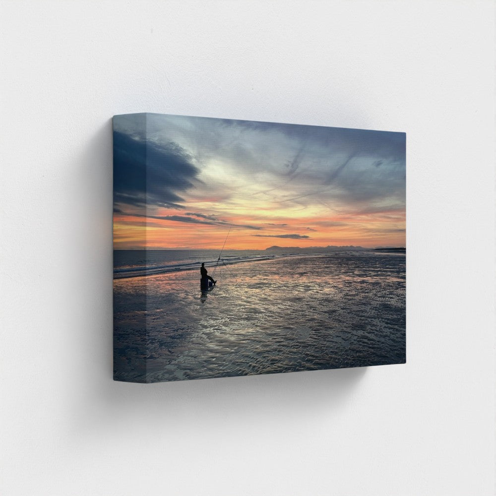 Green Wall Art Blackpool Beach Red Sunset: panoramic view of red sky over sea with lone angler silhouette