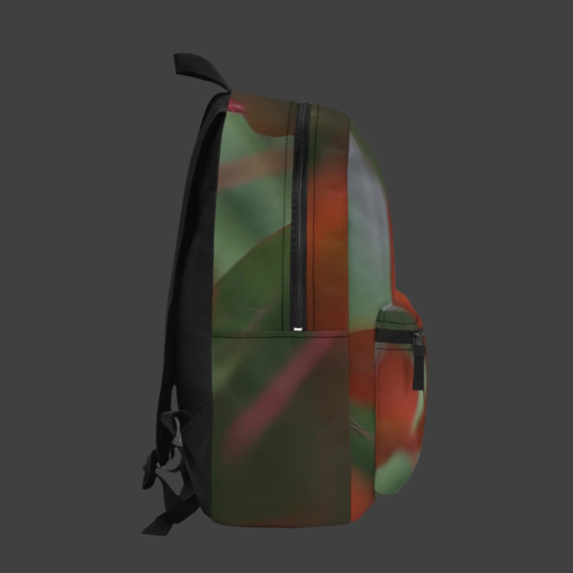 Left side of botanical backpack showing leafy textures, blurred foliage details, and a side pocket.
