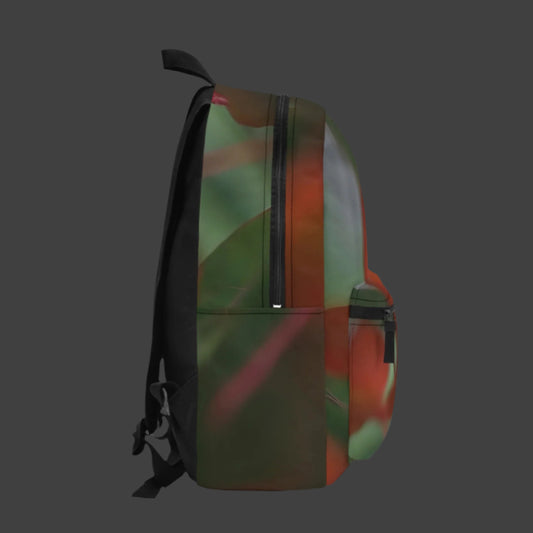 Left side of botanical backpack showing leafy textures, blurred foliage details, and a side pocket.
