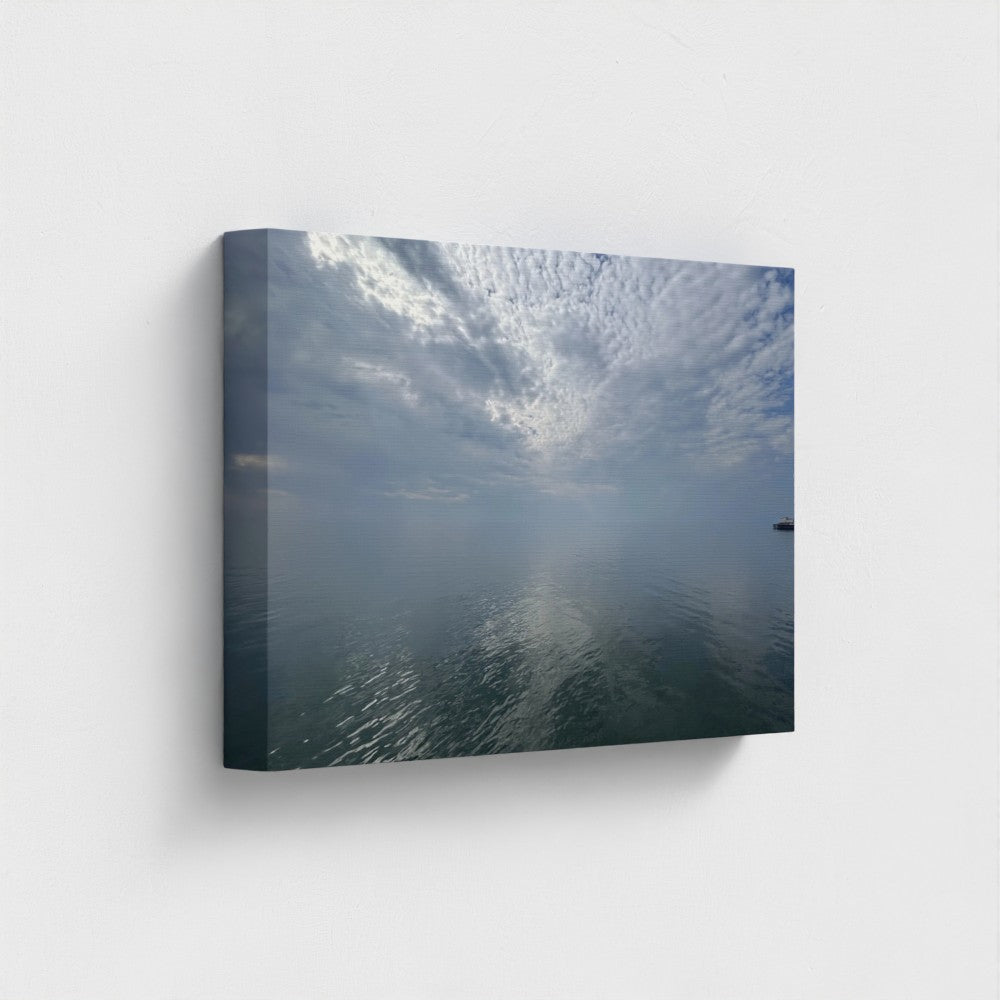 Eco-friendly canvas print of Blackpool seascape with layered clouds, calm water reflections, and a distant pier under a quiet sky, size: 18''x12''