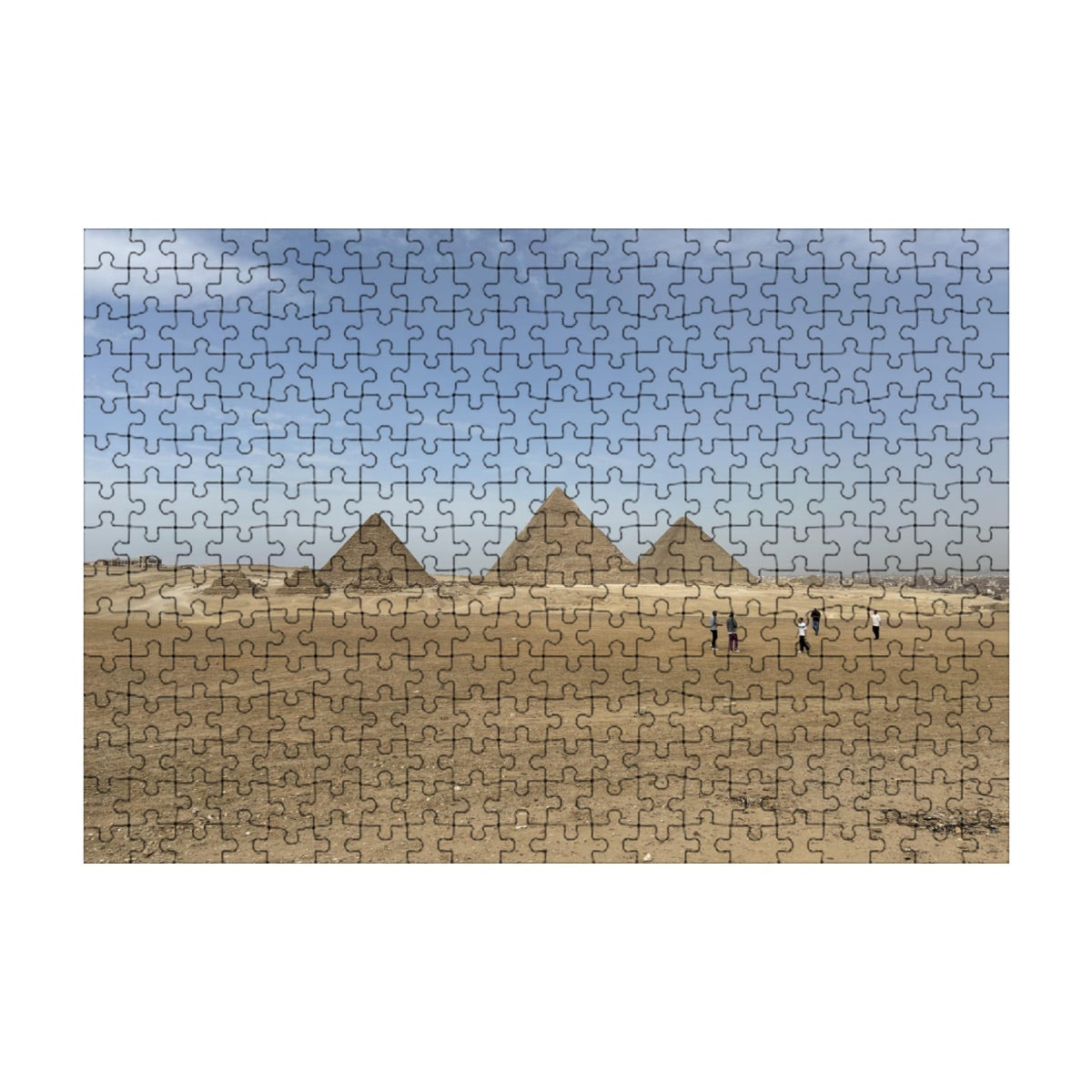 Full color image of the Pyramids of Giza under a bright blue sky with golden desert sands.