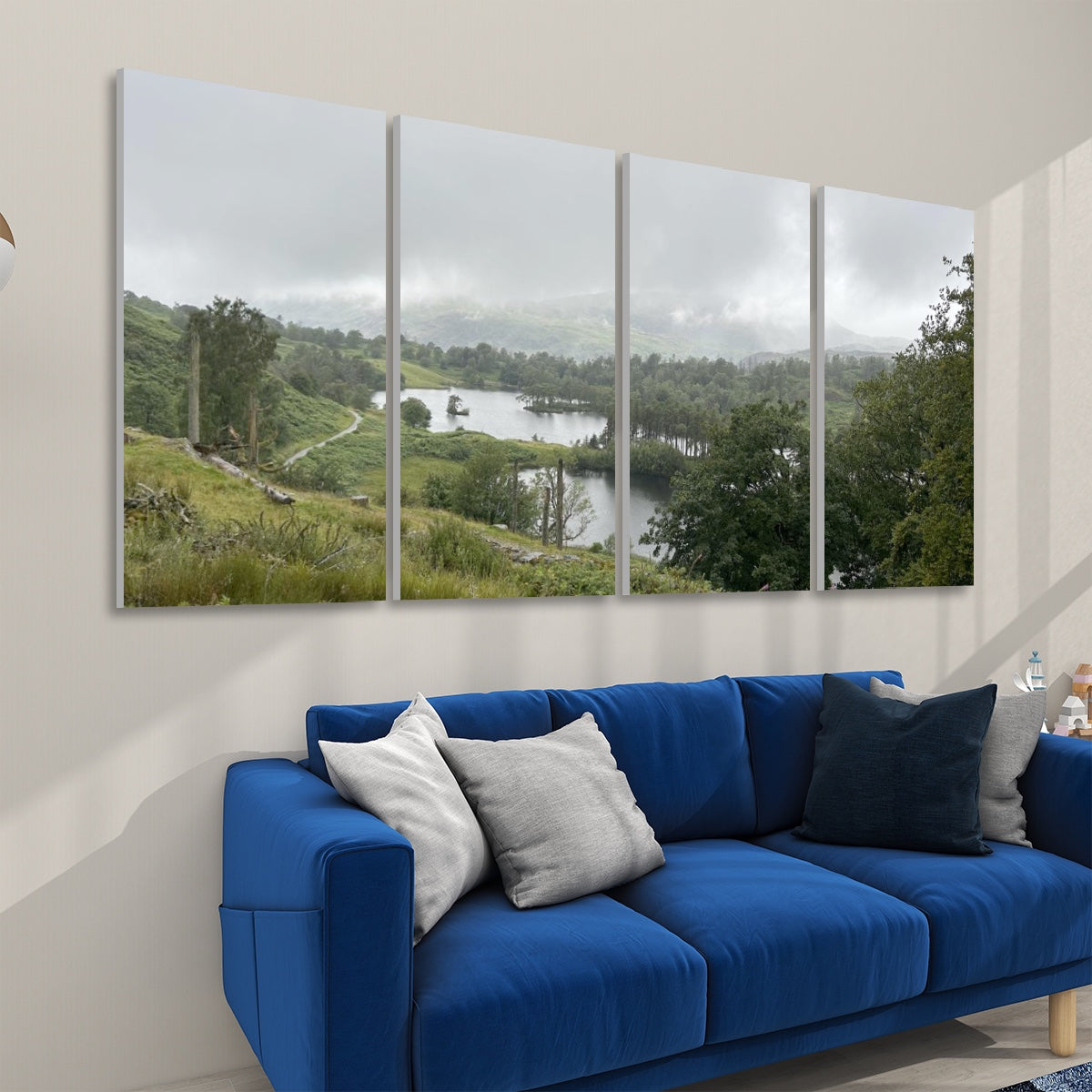4 Decorative Sound Absorbing Panels Featuring Lake District Landscape above blue sofa in living room