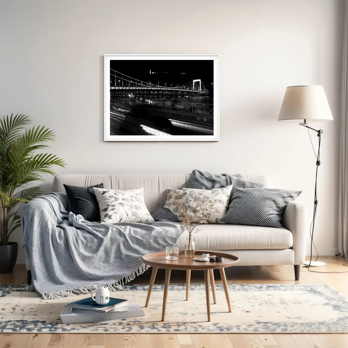 photograph of a Budapest bridge with historic architecture and river backdrop.