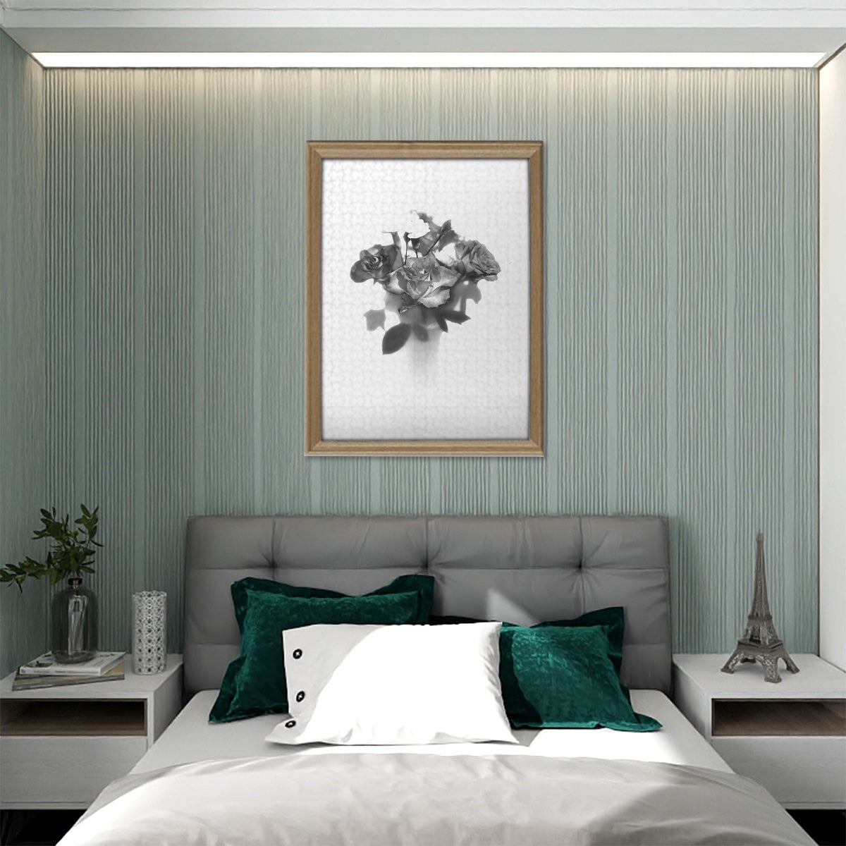 Framed greyscale rose bouquet jigsaw puzzle (15 × 10.2 inches) showcased on a shelf in a modern living room, demonstrating finished artwork.