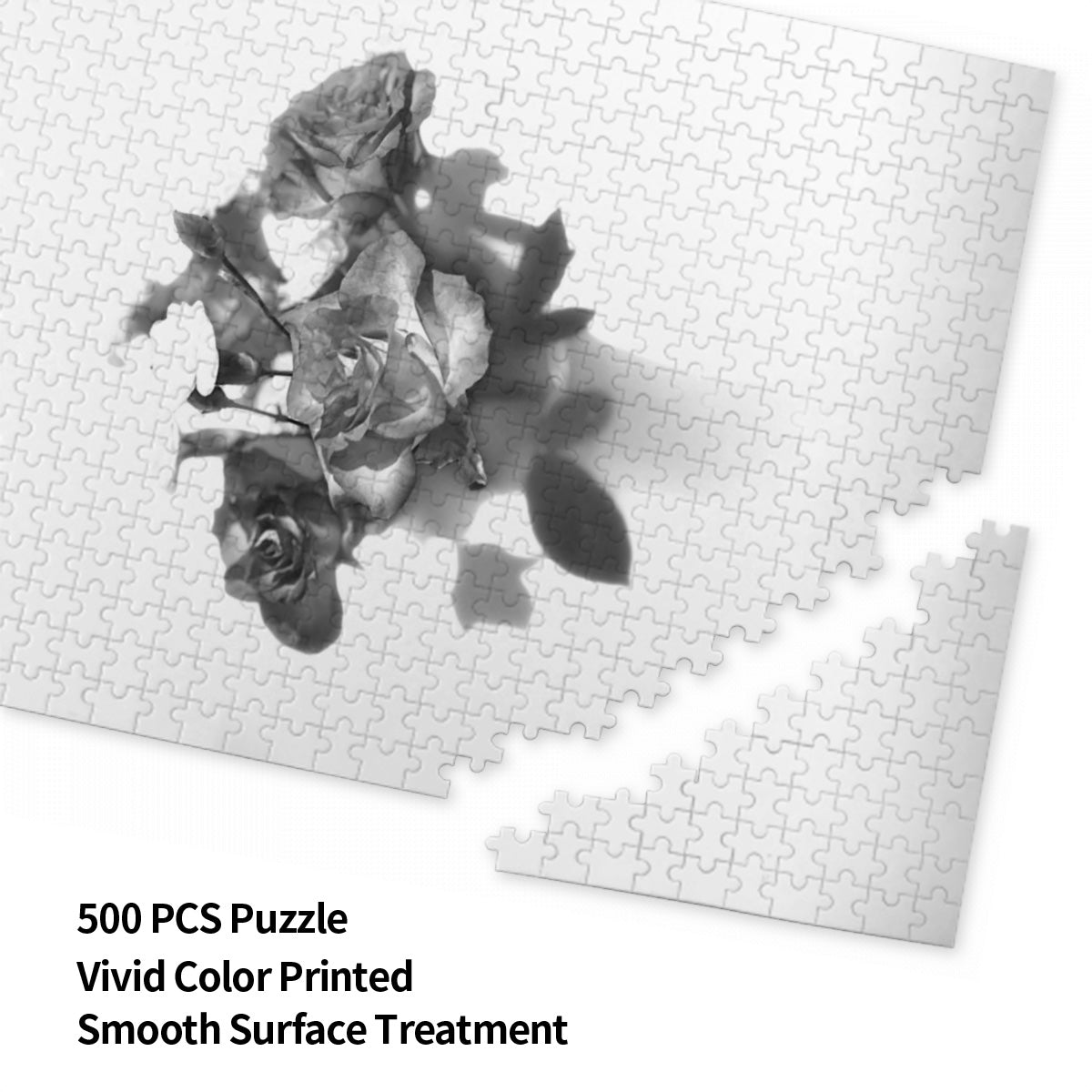 Front view of the 500‑piece wooden jigsaw puzzle box showing a greyscale rose bouquet image, labelled 20.5 × 15 inches, basswood pieces.