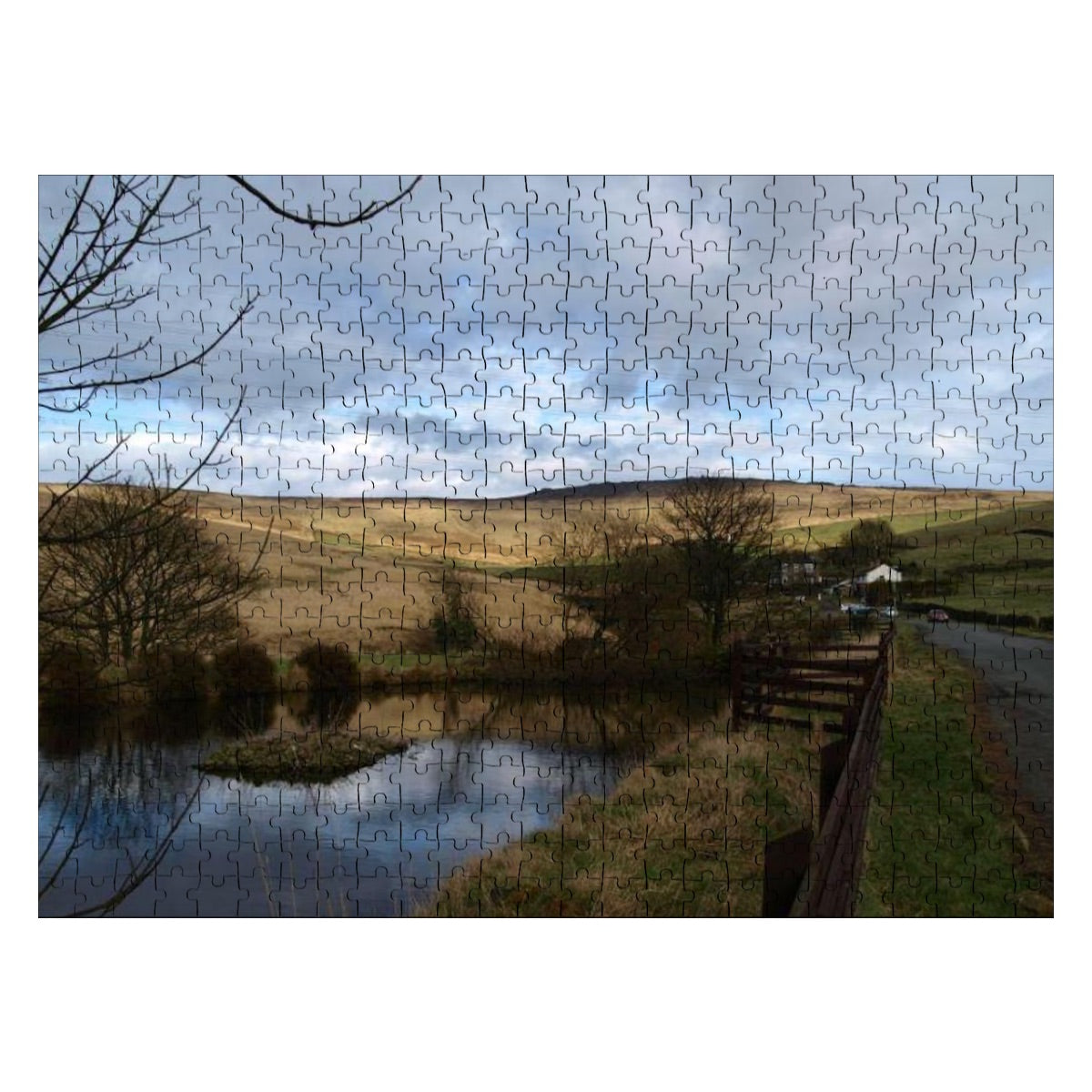 500-piece wooden puzzle showing a golden British landscape with trees and pond, in natural soft color tones.