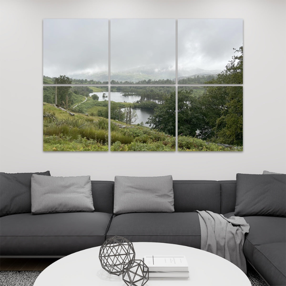 6 Decorative Sound Absorbing Wall Panels featuring Tarn Hows Lake District Landscape. Six panel wall art above gray sofa