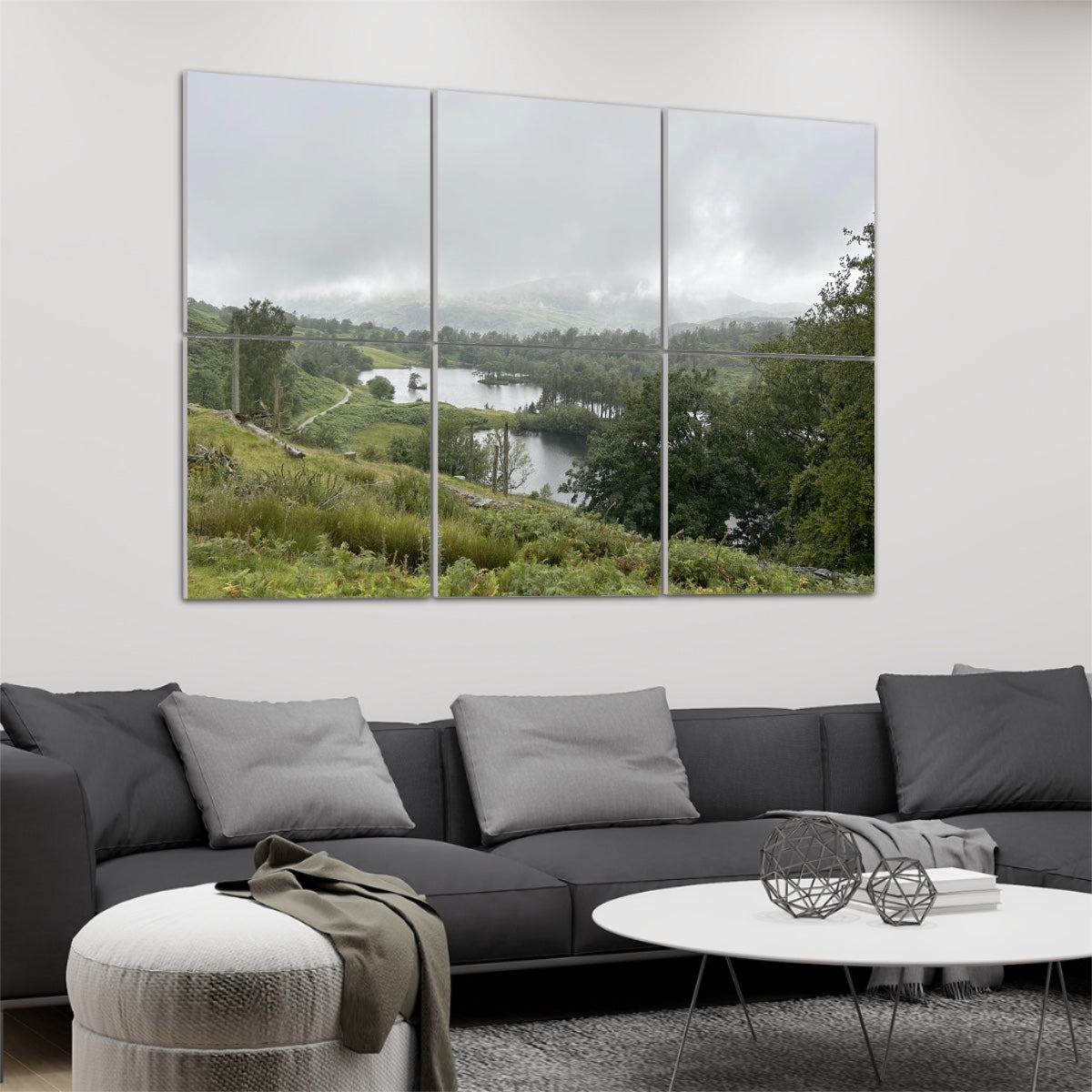 6 Decorative Sound Absorbing Wall Panels featuring Tarn Hows Lake District Landscape. Above gray sofa in modern living room