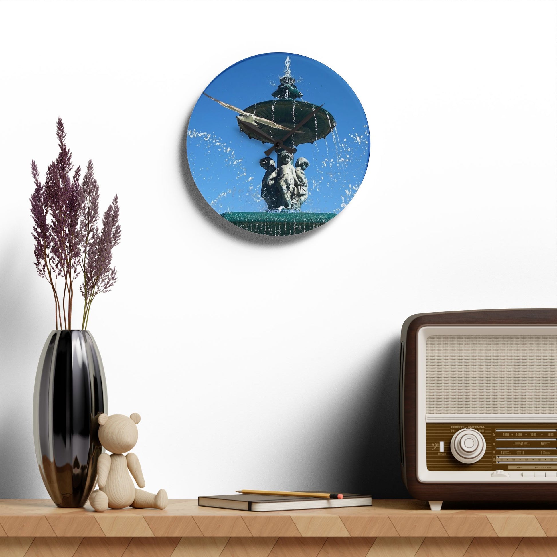 Acrylic wall clock featuring seagull in flight, blue sky and fountain in Lisbon