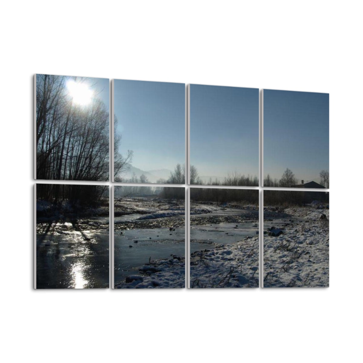 Left-angle view of full color Winter Stream wall panels with crisp snow detail, cool lighting, and forest textures.