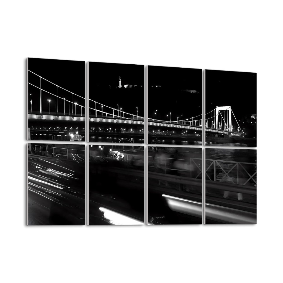 Left-angle view of Budapest Bridge wall art in full color with glowing night lights and riverside architecture.