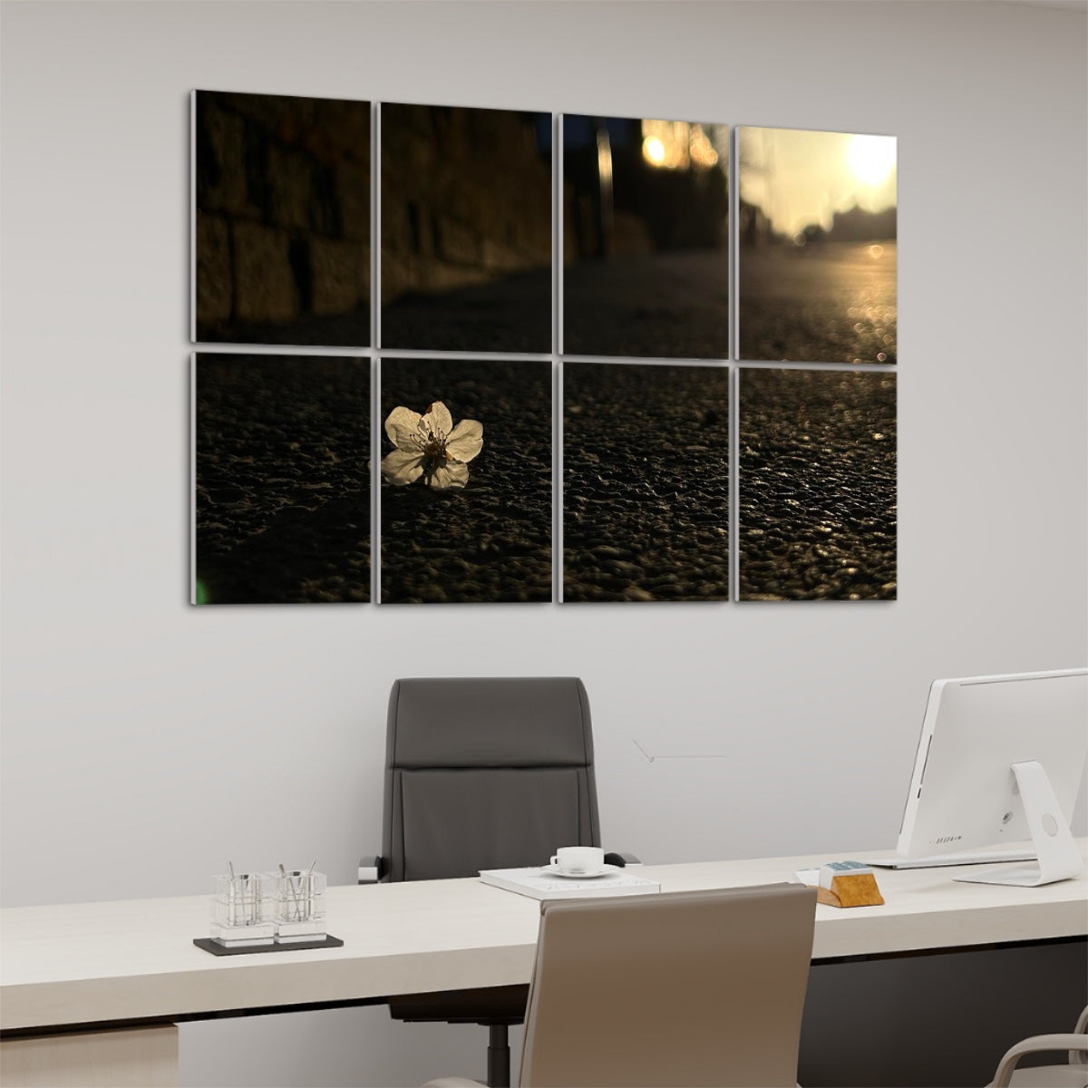 Left side view of full-color acoustic wall panels featuring a white blossom on textured asphalt in warm sunset light across 8 decorative panels.