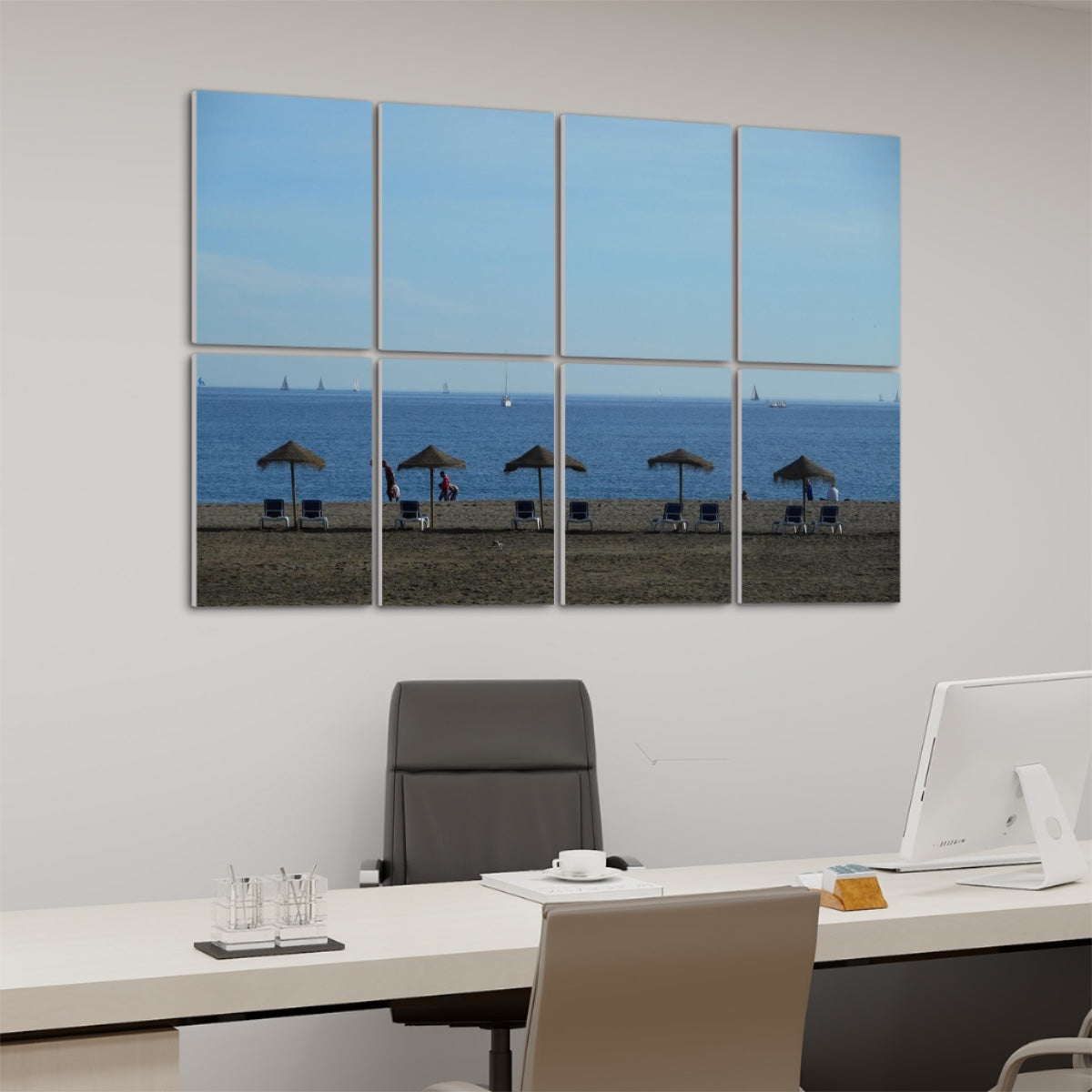 Angled left-side view of full-color acoustic wall panels featuring a peaceful coastal scene with straw umbrellas and lounge chairs facing the sea.