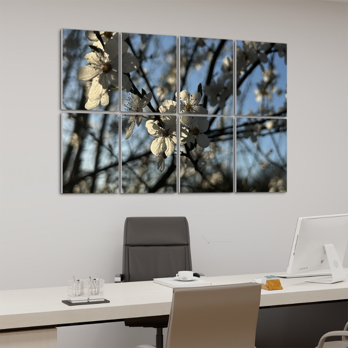 Left angle of 8-panel floral wall art showing blooming white blossoms and shadows against a bright blue spring sky.