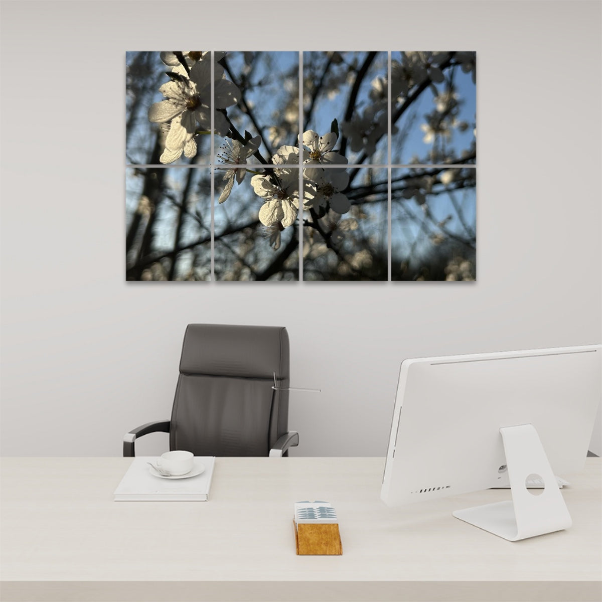 Eight floral acoustic wall panels featuring white blossoms in full bloom on dark branches, backlit by morning sun under a soft blue sky.