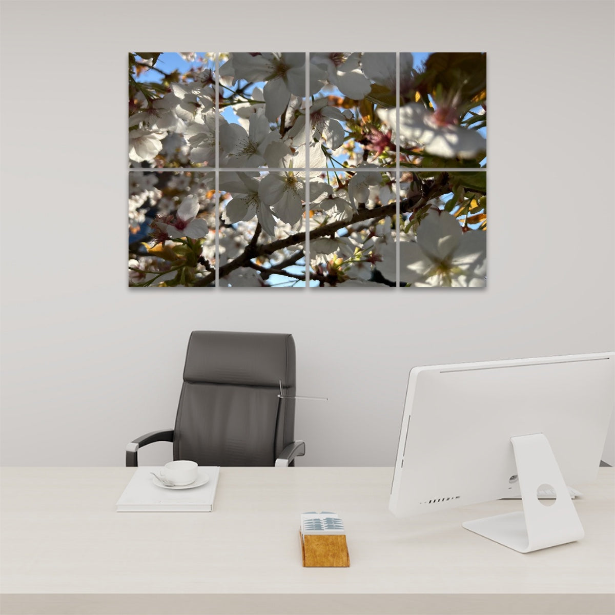 White spring blossoms in full bloom with tree branches and a clear blue sky, divided across 8 decorative sound absorbing wall panels.