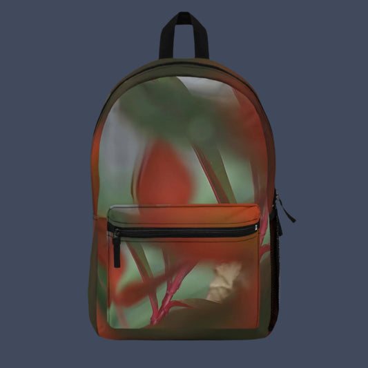 Front view of colorful botanical backpack featuring abstract foliage design with layered leaves and natural light.
