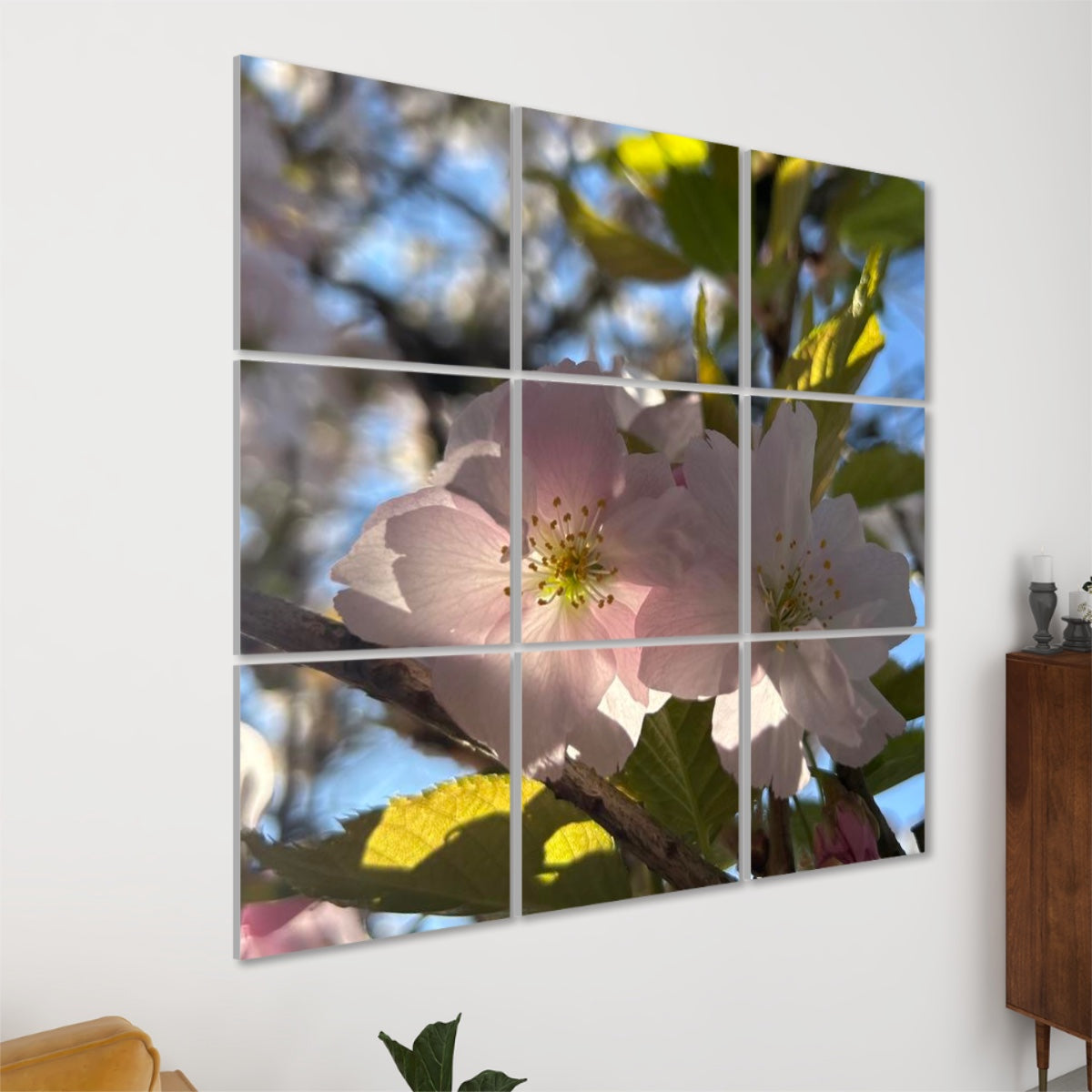 Left side view of 9 acoustic wall panels featuring sunlit pink blossoms and spring foliage under a bright sky.