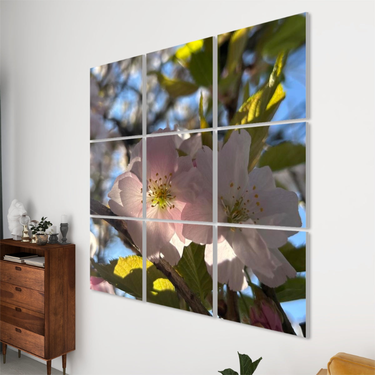 Right angle view of the full color floral panels showing delicate pink petals and glowing natural light divided over 9 sound panels.