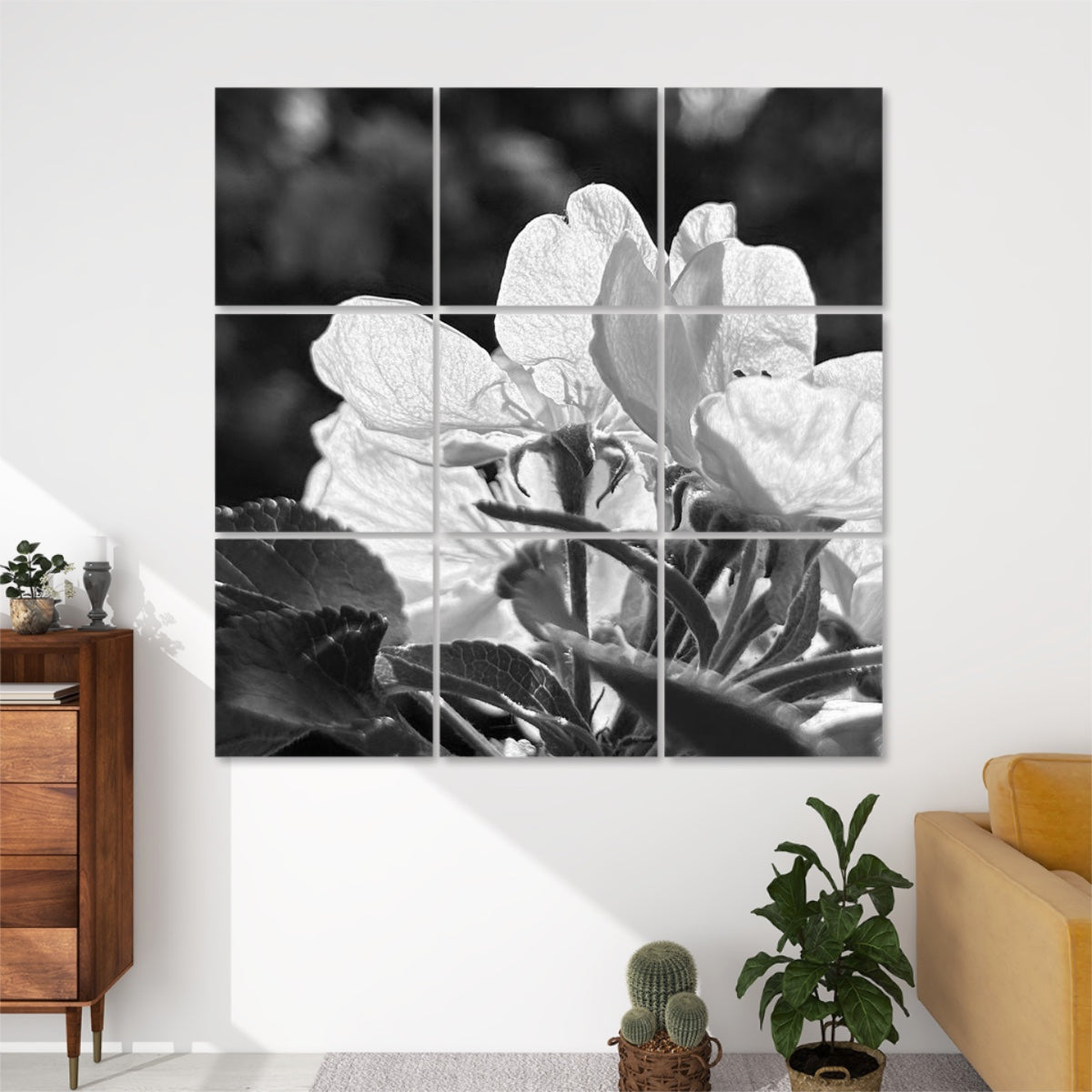 Black and white close-up of dramatic flower petals and foliage with strong lighting, divided across 9 decorative sound absorbing panels.