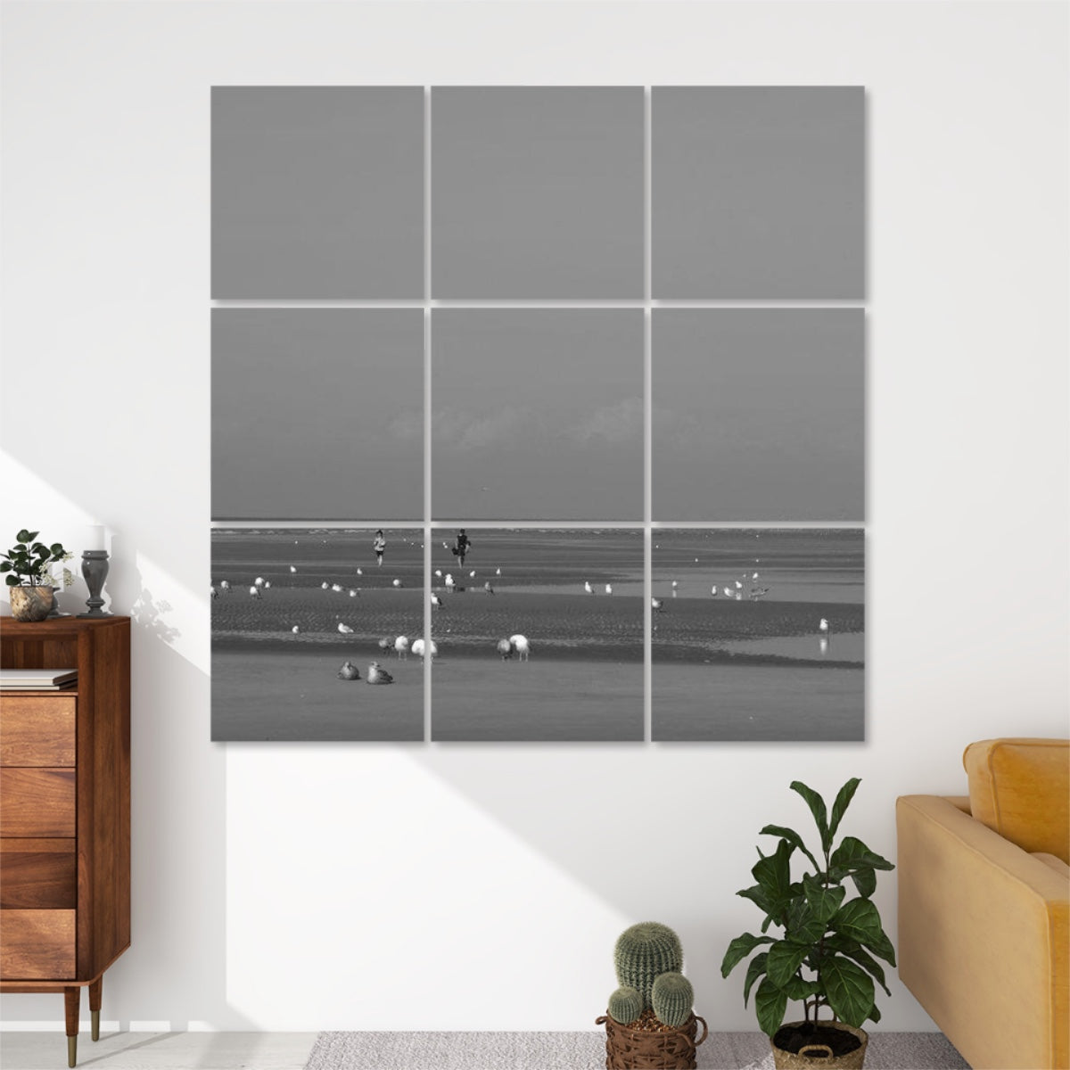 Greyscale version of 9-panel acoustic wall art showing a peaceful beach at low tide with seagulls and soft grey tonal transitions.
