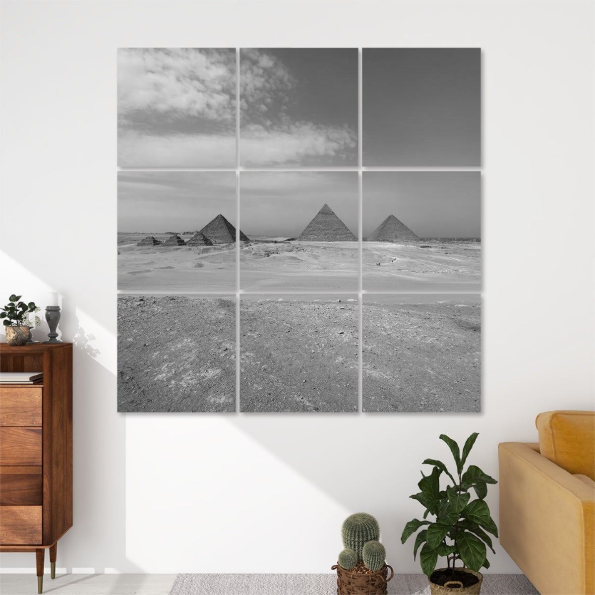 Greyscale 9-panel sound-absorbing wall art showing the Pyramids of Giza in soft monochrome tones beneath a clouded sky.
