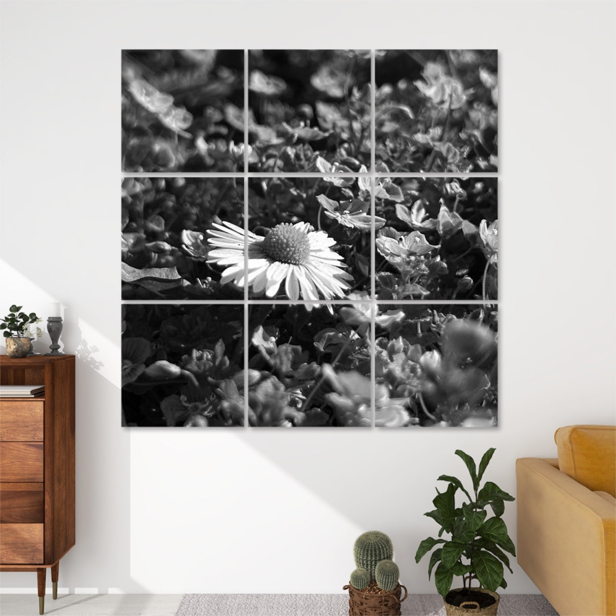Greyscale version of floral 9-panel wall art with a white daisy surrounded by wild violets in soft monochrome tones.