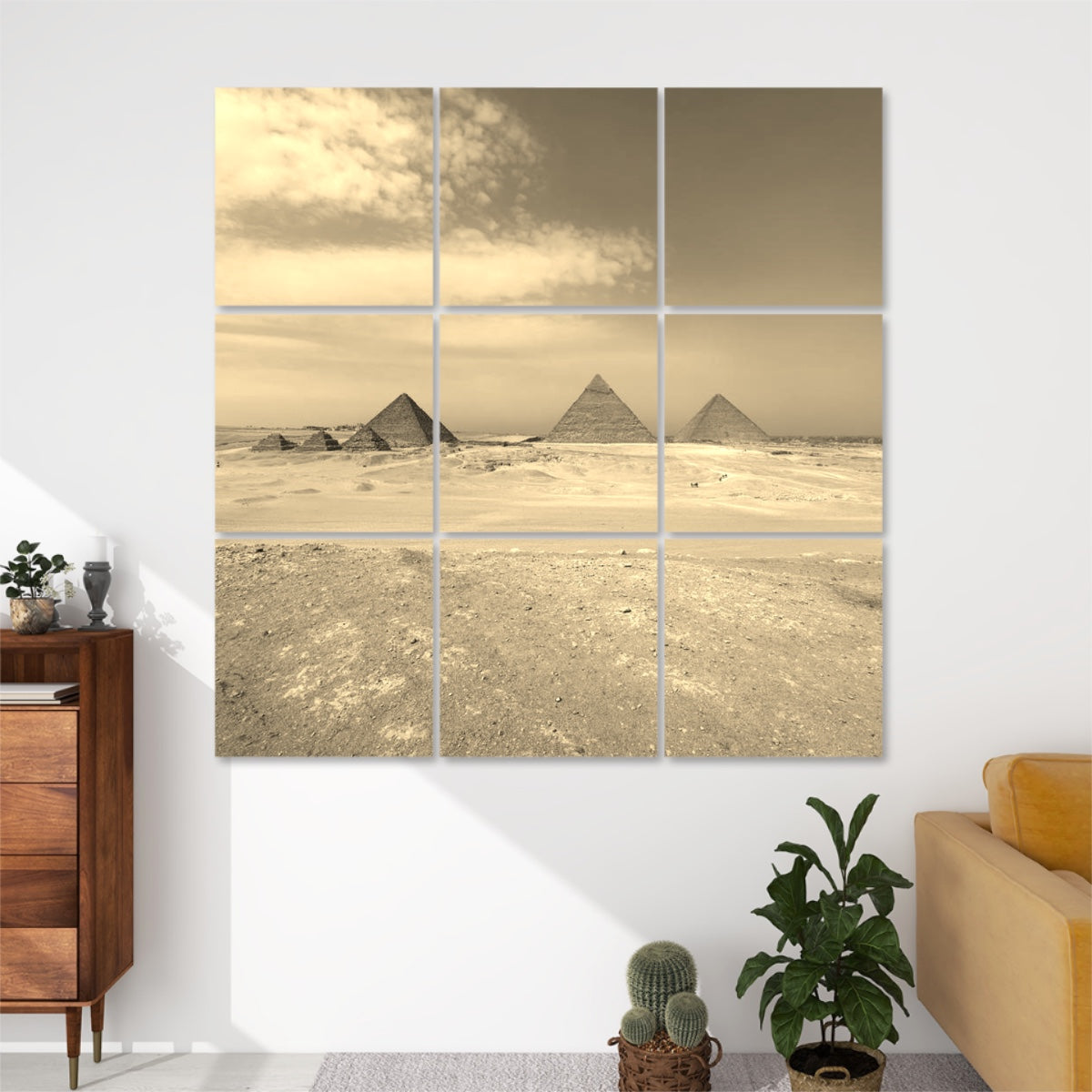 Sepia-toned 9-panel acoustic wall art of the Pyramids of Giza, featuring warm vintage hues and subtle cloud texture above the desert landscape.