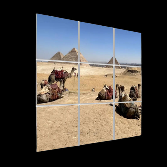 Left‑side angled view of the 3 × 3 full‑color camel‑and‑pyramids acoustic panel set, highlighting panel depth and vivid desert hues.