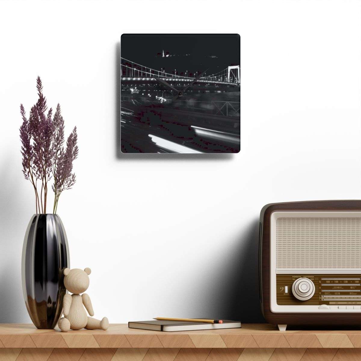 Acrylic Wall Clock featuring black and white long exposure photograph of bridge in Budapest by night with citadel in the background and car in the foreground