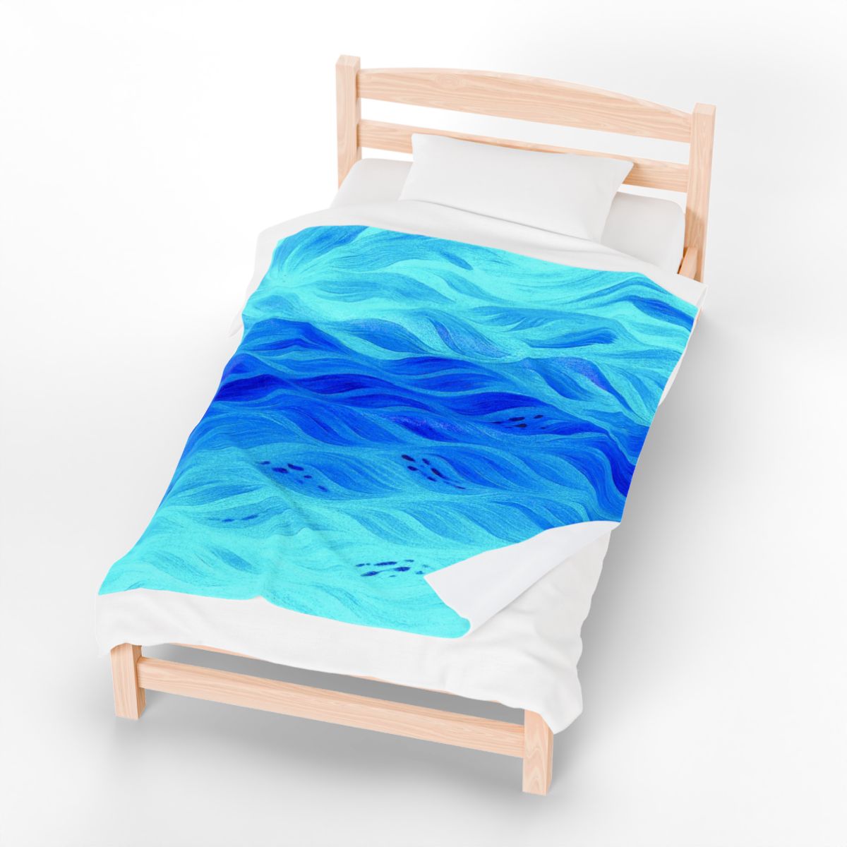 Bright aqua-blue throw blanket in azure variant, waves of color flowing diagonally across a twin mattress