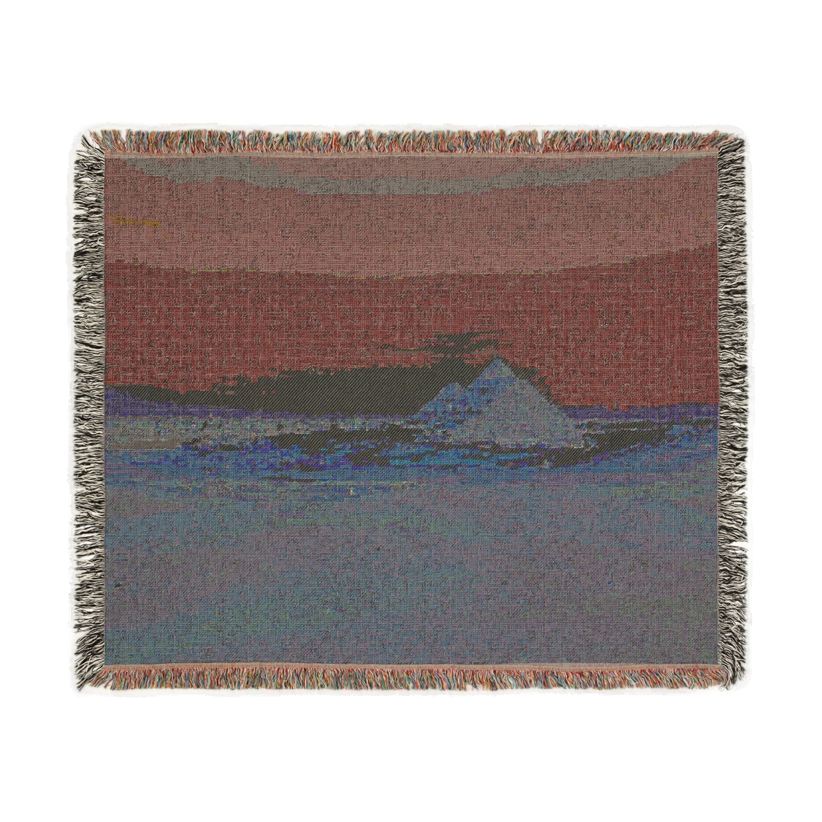 back side of woven blanket featuring desert blue sky and pyramids of Giza