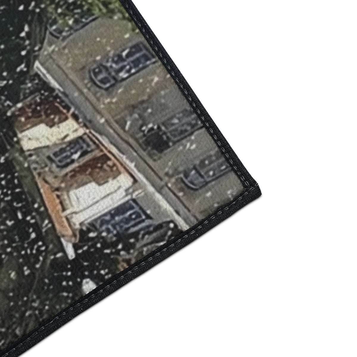 close up of the corner of Heavy Duty Floor Mat featuring seagull in flight with fountain in Lisbon