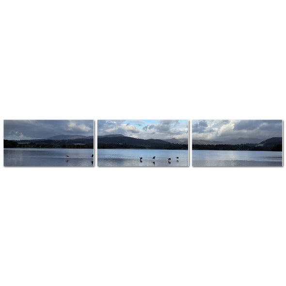 Beautiful triptych of Birds Flying Over Windermere Lake - Lake District Landscape at sunset