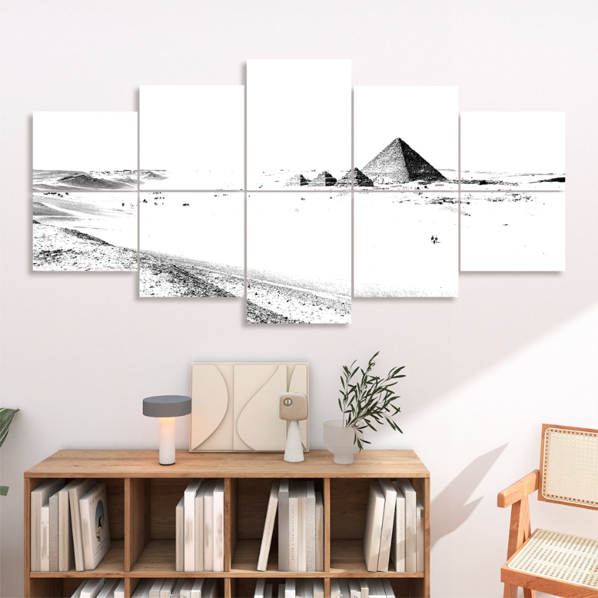 Ten panels depicting the pyramid’s silhouette and dunes in high-contrast black and white against a bright sky