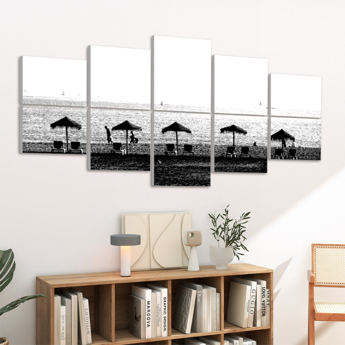 10 panels in black and white showing a Málaga beach with umbrellas chairs and sailboats outlined against the sea, angled view