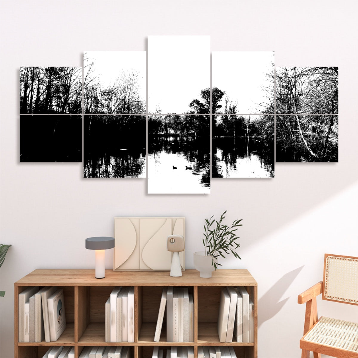 Black and white version of a quiet lake with leafless trees and reflected sky, arranged across 10 acoustic panels in soft contrast.