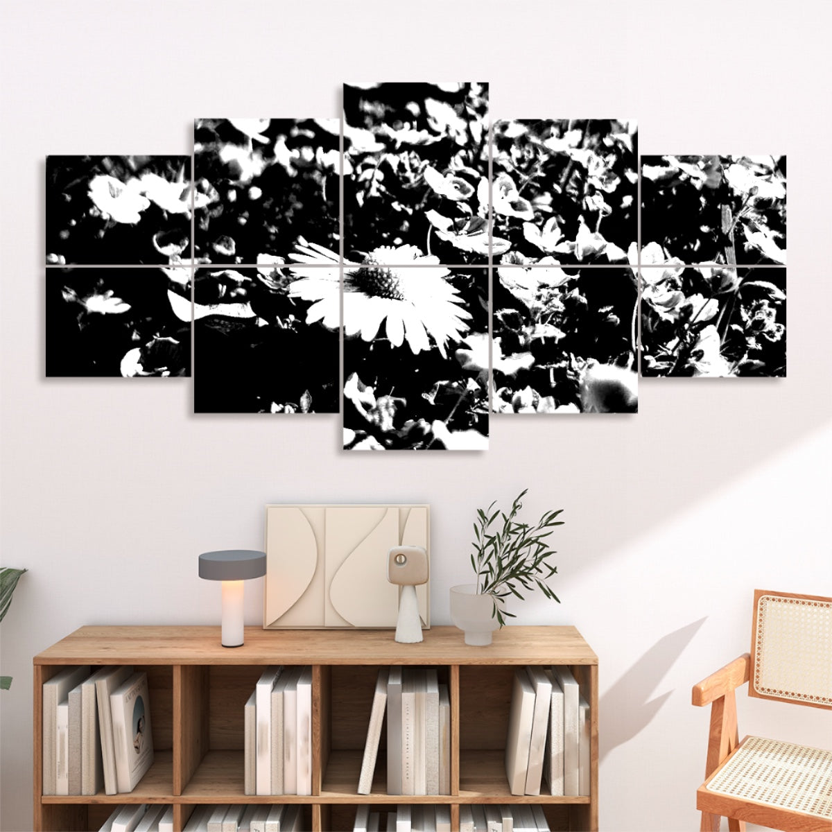 Black and white version of a daisy in a field of small blossoms, arranged across 10 floral sound absorbing panels with bold contrast.