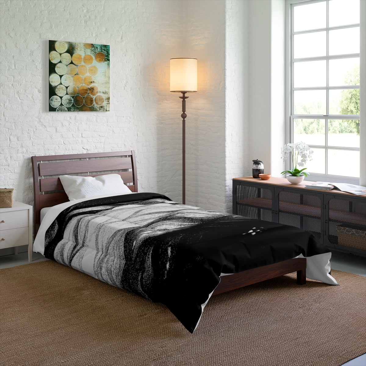Minimalist room mockup with the black and white comforter on a twin bed; bold and graphic styling. Size: 68" × 88"