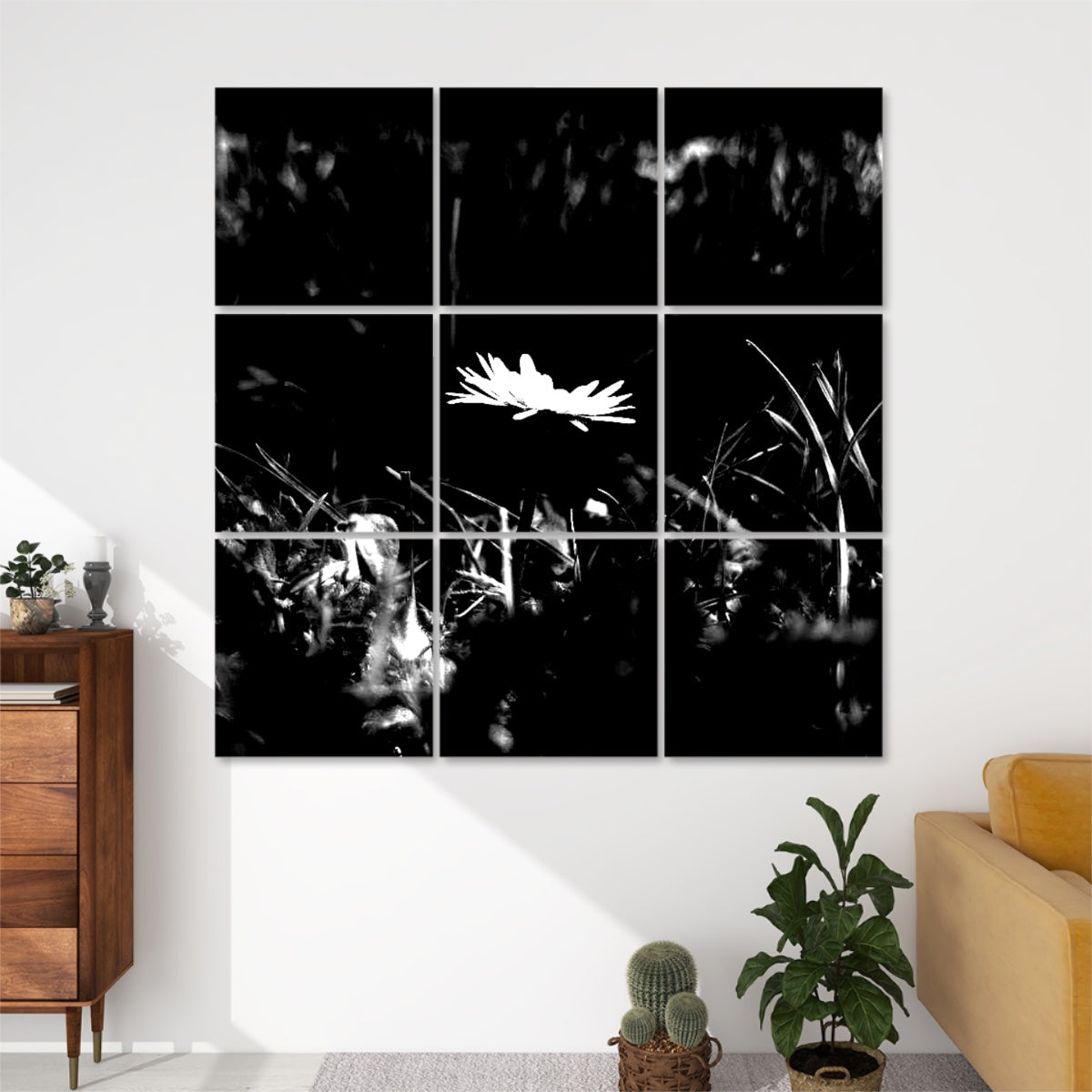 Black and white version of a daisy standing in grass with bold contrast and structure, divided across 9 decorative acoustic wall panels.